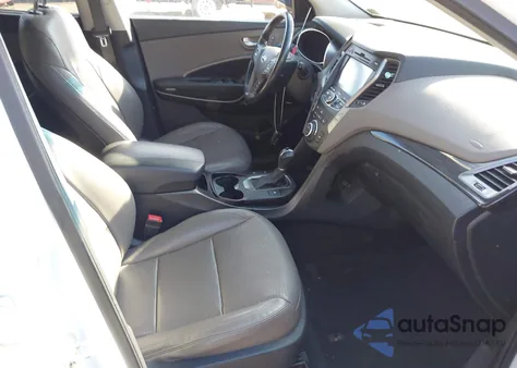 2014 Hyundai Santa Fe Sport 2.4L z USA, uszkodzony, nr VIN 5XYZUDLB7EG227607